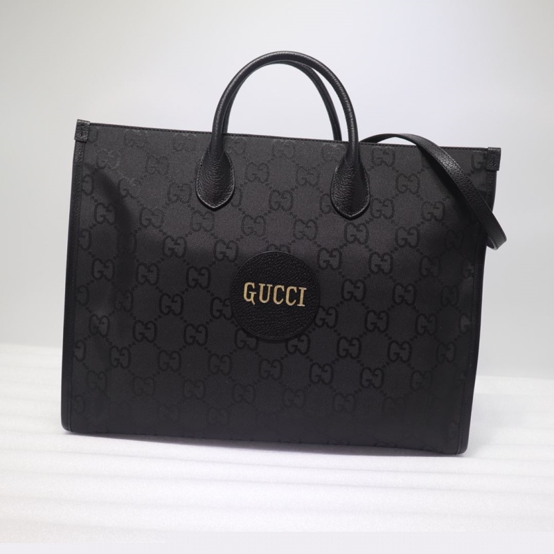 G*u*i shopping bags
